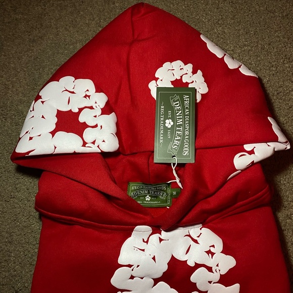 Red Denim Tears Hoodie with White Floral Design